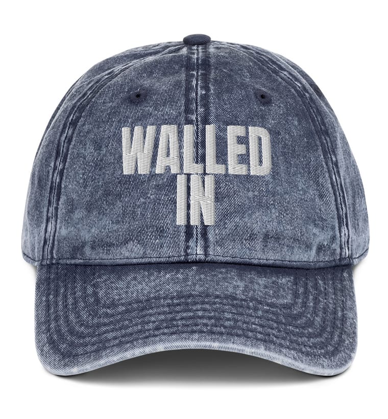 WALLED IN wordmark cap in washed navy, embroidered